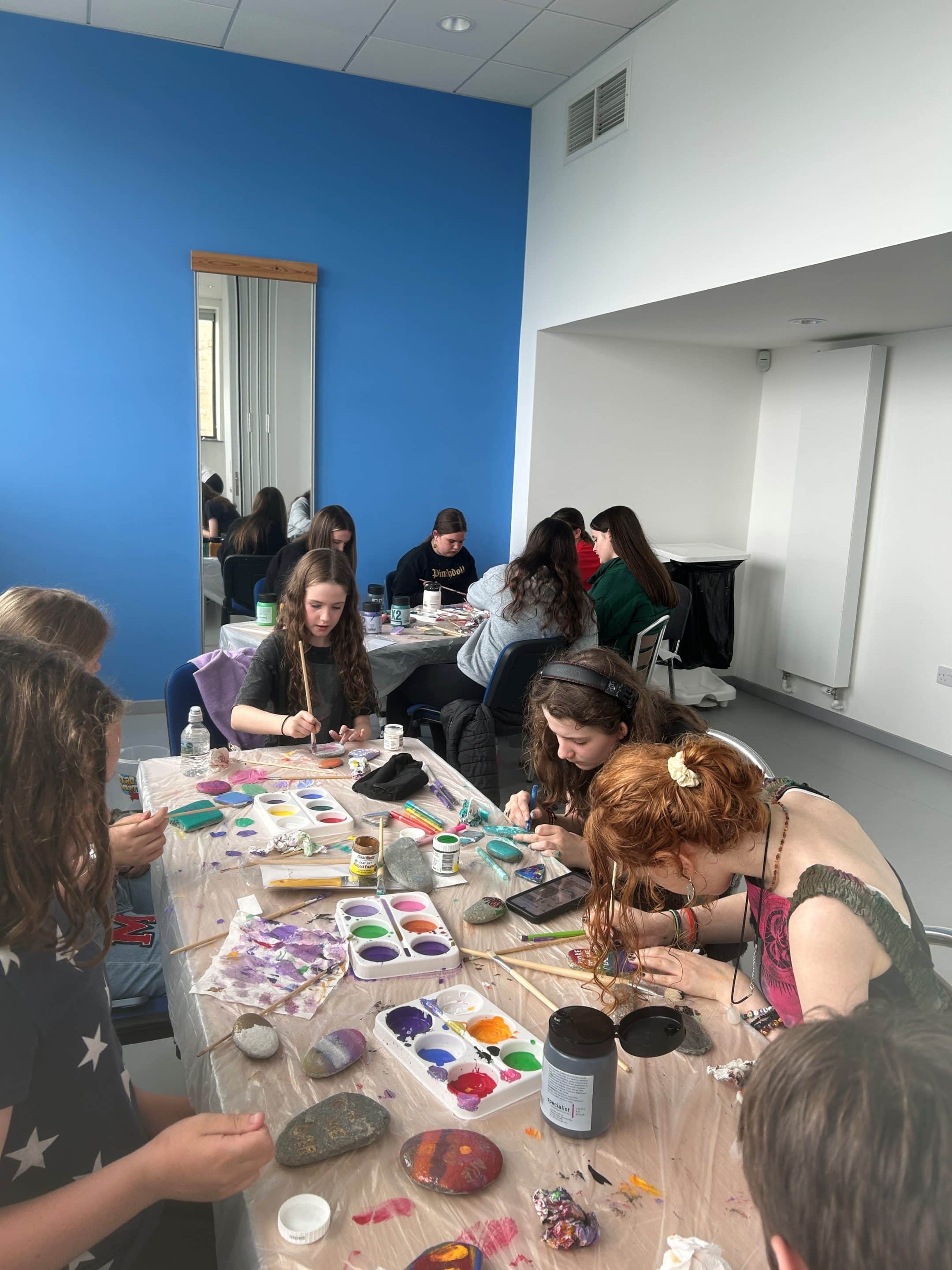 Outside Youth in front of hut