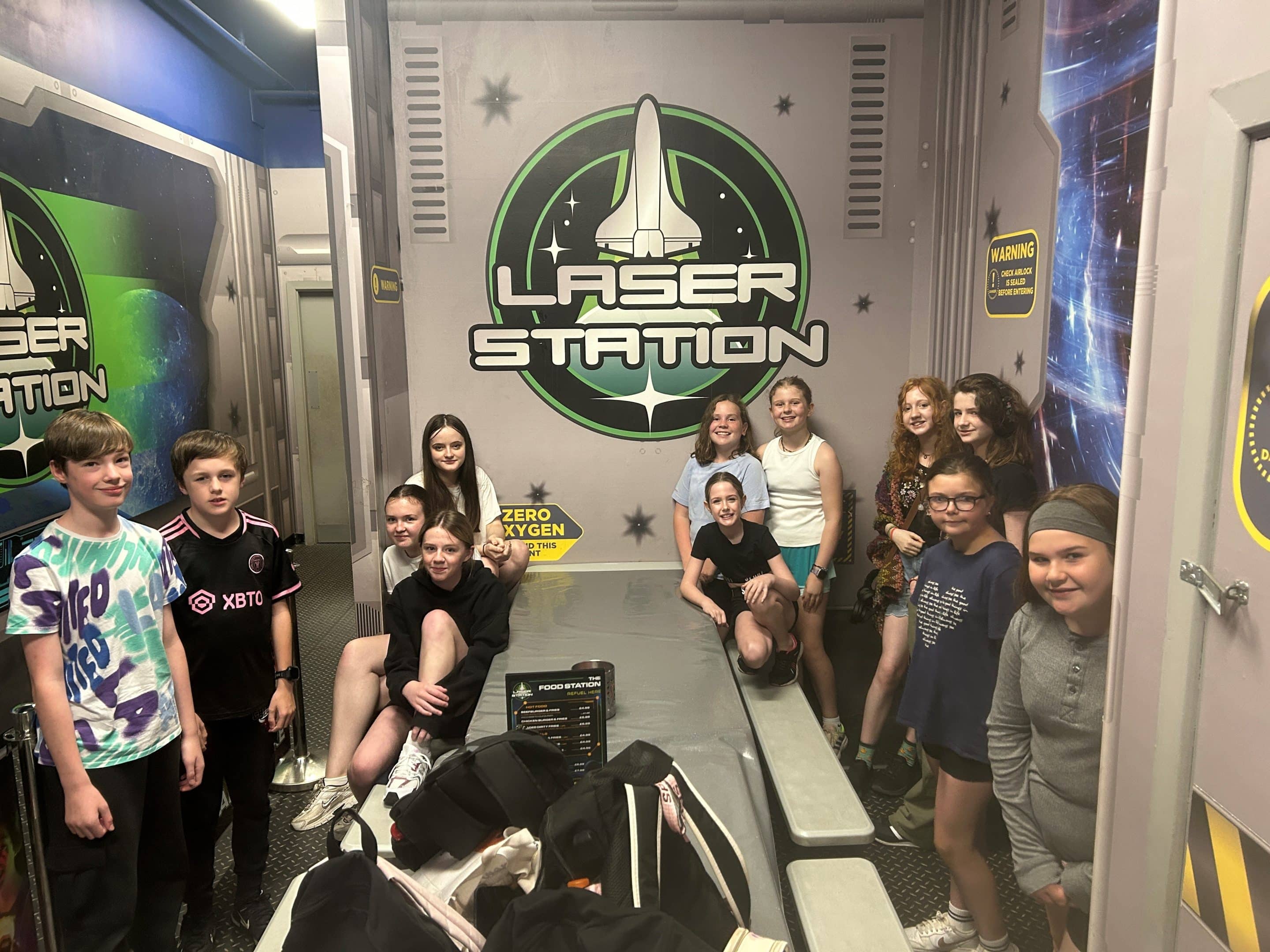 Outside Youth in front of hut