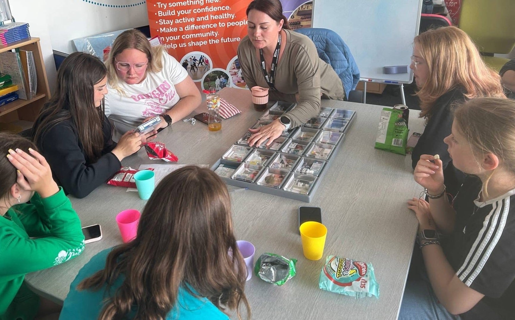 Outside Youth in front of hut